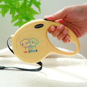 Laisse rétractable jaune pour chien avec illustration de dessin animé et sangle nylon