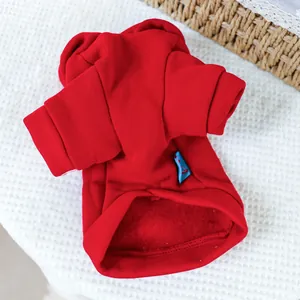 Detail of red pet hoodie with soft fleece lining and high-quality cotton knit fabric