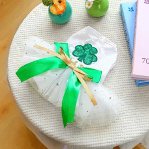 Detail of St. Patrick's dog dress with green sequin clover and layered tutu skirt