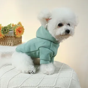 Close-up of bean green pet hoodie with white letter print and ribbed cuffs for small dogs