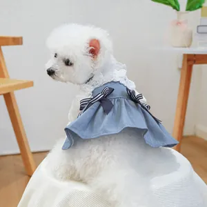 Blue denim pet dress with white lace collar and bow for small dogs and cats