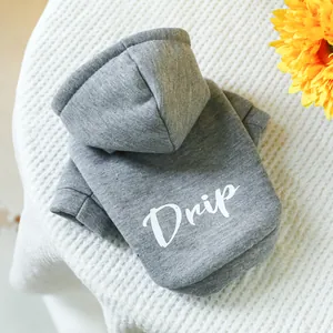 Detail of grey pet hoodie featuring white Drip print on soft knit fabric for small dogs