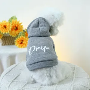 Detail of grey pet hoodie featuring white Drip print and soft ribbed cuffs for small dogs