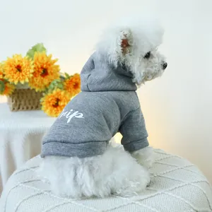 Close-up of gray dog hoodie with white Drip letter print and cozy cotton texture