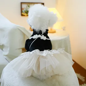 Detailed view of luxury pet dress with pearl collar and layered white tulle skirt