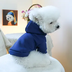 Close-up of a navy blue hooded pet sweatshirt with thick cotton fabric for small dogs