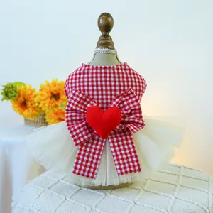 Close-up of pet tutu dress featuring a red checkered bow and 3D heart detail on soft white tulle
