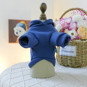 Cozy blue hooded pet sweater for small dogs or cats displayed on a cute mini hanger