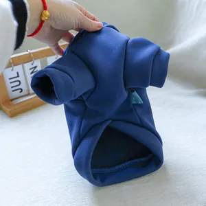 Detail of dark blue pet hoodie showing thick warm fleece lining and cotton texture