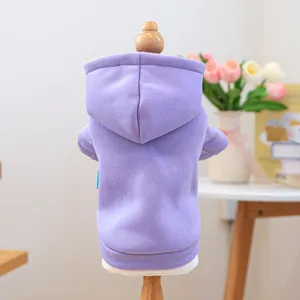 Rear view of lavender purple pet hoodie with ribbed edges on a wooden mannequin