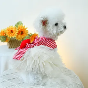 Detail of red and white checkered pet dress with heart applique and layered gauze tutu