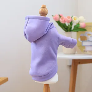 Close-up of lavender pet hoodie with ribbed cuffs on a wooden mannequin stand