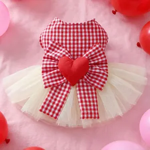 Red and white checkered pet dress with heart-shaped bow and tiered tulle skirt