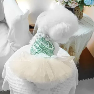 Detail of sequined bodice and pearl neckline on a white tulle pet wedding dress