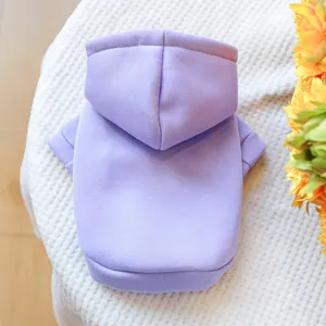 Detailed view of lavender pet hoodie with ribbed cuffs on waffle fabric background