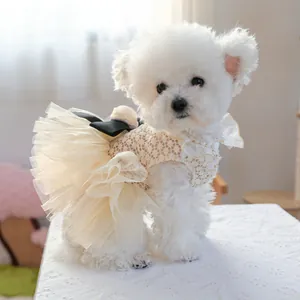 Close-up of crochet lace bodice and multi-layer tulle tutu on dog wedding dress