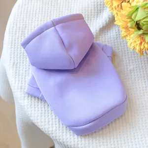 Detail of light purple hooded pet sweatshirt featuring ribbed cuffs and soft knitted fabric