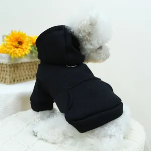 Detail of black hooded dog sweatshirt with ribbed cuffs and large back pocket decoration