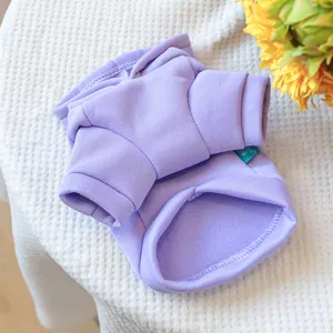 Close-up of lavender purple pet hoodie with ribbed cuffs and soft fleece texture