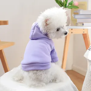 Close-up of lavender pet hoodie with ribbed cuffs and soft hood on a small dog