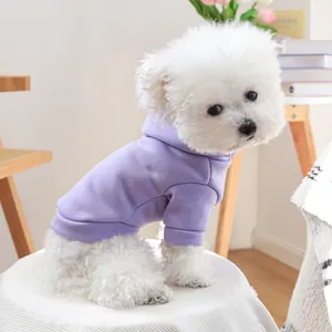Light purple pet hoodie with ribbed cuffs shown on a white bichon frise dog