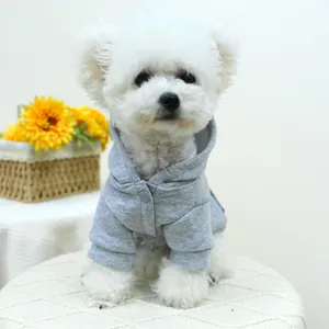 Detail of grey pet hoodie with soft cotton fabric and single button closure for dogs
