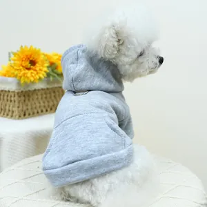 Detailed view of gray pet hoodie featuring a metal D-ring for leash attachment