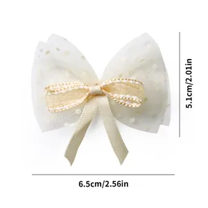 Detailed view showing a white mesh pet bow clip with precise 6.5cm width dimensions