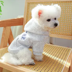Detail showing grey pet hoodie with blue York embroidery and adjustable drawstring hood