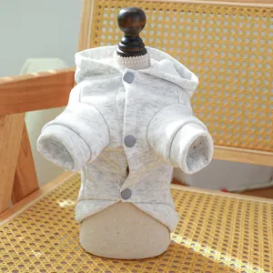 Detail of grey pet hoodie with soft texture, three-button closure and ribbed cuffs