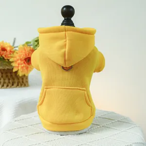 Warm yellow hooded pet sweatshirt with back D-ring and pocket for small dogs