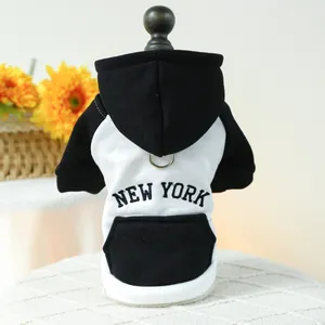Detail of dog hoodie with New York embroidery, metal leash ring and decorative pocket