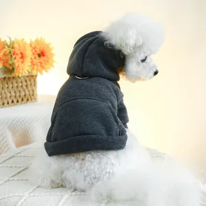 Dark grey pet hoodie detail featuring a built-in metal D-ring for leash attachment