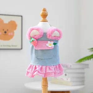 Pink strawberry denim dog dress with plush ears and floral accents for small pets