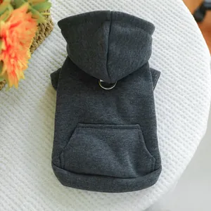 Detail of dark grey pet hoodie featuring a metal D-ring for leash attachment and kangaroo pocket