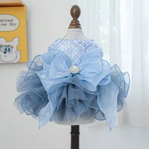 Elegant blue pet wedding dress with sequined snowflake patterns and organza bow