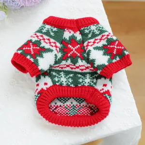 Macro view of Christmas knit pet sweater with snowflake patterns and ribbed edges