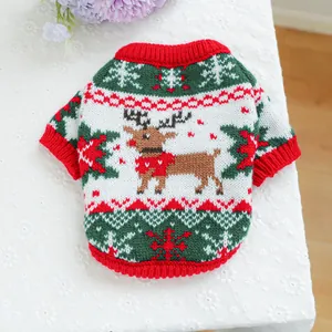 Close-up of knit Christmas pet sweater featuring reindeer and snowflake patterns