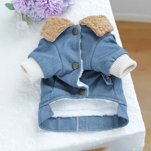 Detail of dog denim jacket with warm sherpa lining and brown faux fur collar
