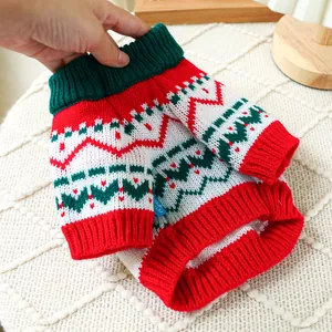 Detail of Christmas pet knit sweater with reindeer pattern and ribbed turtleneck collar