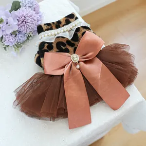 Elegant leopard print pet dress with layered brown tulle and a vintage cameo bow decoration