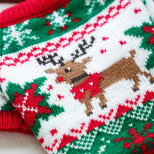 Cozy Christmas reindeer pet sweater with red and green knitted festive holiday patterns