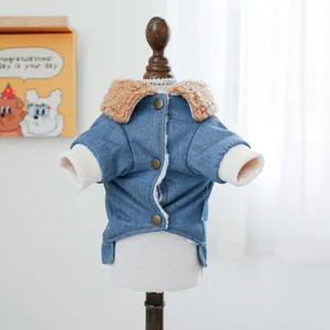 Detail of denim dog jacket featuring warm sherpa collar and vintage metal buttons