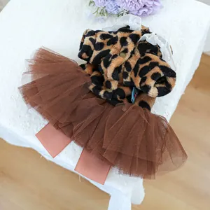 Close-up of leopard print plush pet dress with lace collar and layered mesh tulle skirt