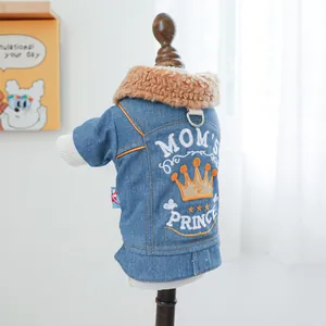 Detail view of denim pet jacket featuring Mom's Prince embroidery and plush fur collar