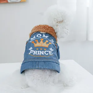 Detail of dog denim jacket featuring white Mom's Prince embroidery and plush collar