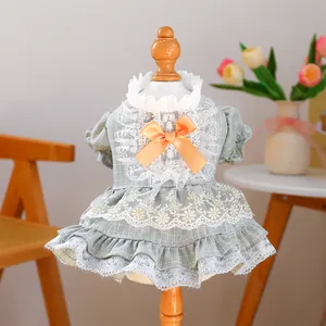 Green plaid pet dress with white lace ruffle collar and orange bow for small dogs