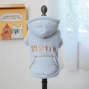 Light blue waffle textured pet hoodie with brown embroidery and a back kangaroo pocket