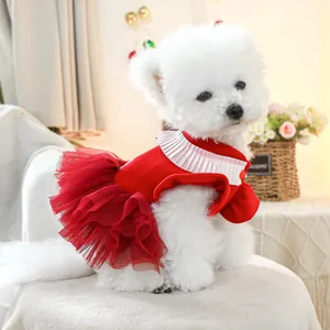 Detailed view of luxury red dog dress with white ruffled collar and layered mesh tutu