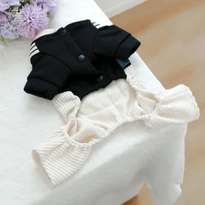 Detail of snap button closure and ribbed knit texture on pet overall jumpsuit